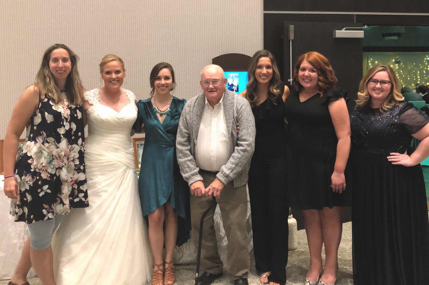 Members of the Charger tennis program gather at Shannon Joyce's wedding. From L-R: Kelly (Kyle) Kidd, Shannon (Joyce) Collier, Abby Williams, Bob Nabors, Samantha (Storms) Sells, Sarah Storms, and Emily Williams.
